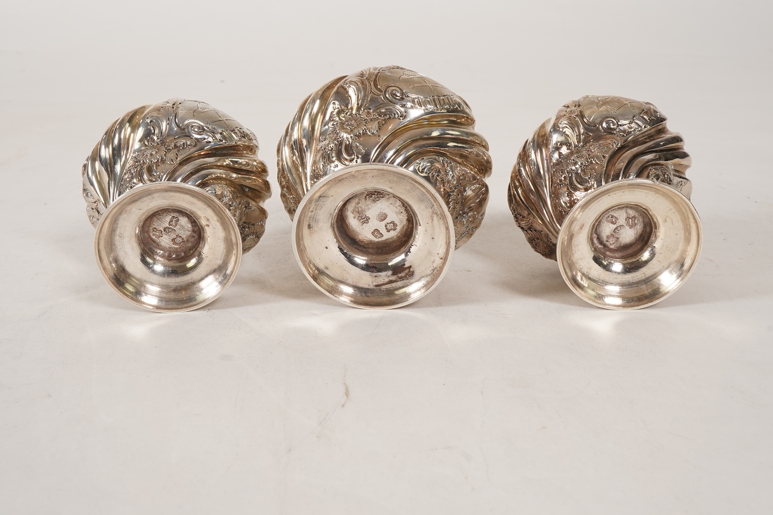 A pair of George II silver tea caddies and matching sugar box with covers, by Samuel Taylor